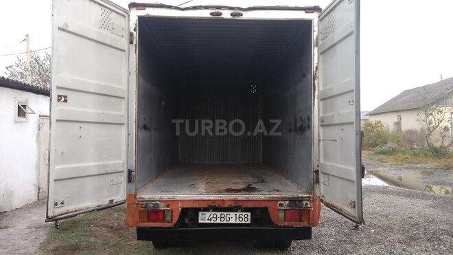 Isuzu NKR 55 L 2008, 208,000 km - 2.8 l - Saatlı