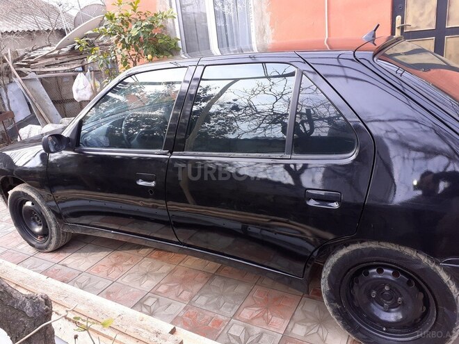 Peugeot  1996, 300,000 km - 1.4 l - Bakı