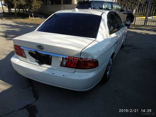 Kia Optima 2004, 296,000 km - 2.0 l - Bakı