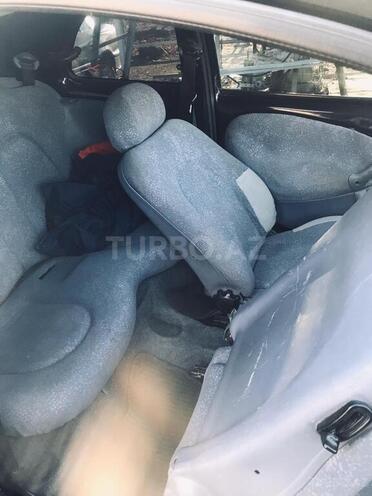 Ford  1997, 98,000 km - 1.5 л - Qazax