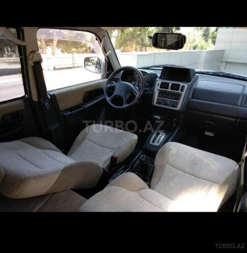 Mitsubishi Pajero io 2003, 263,000 km - 2.0 л - Sumqayıt