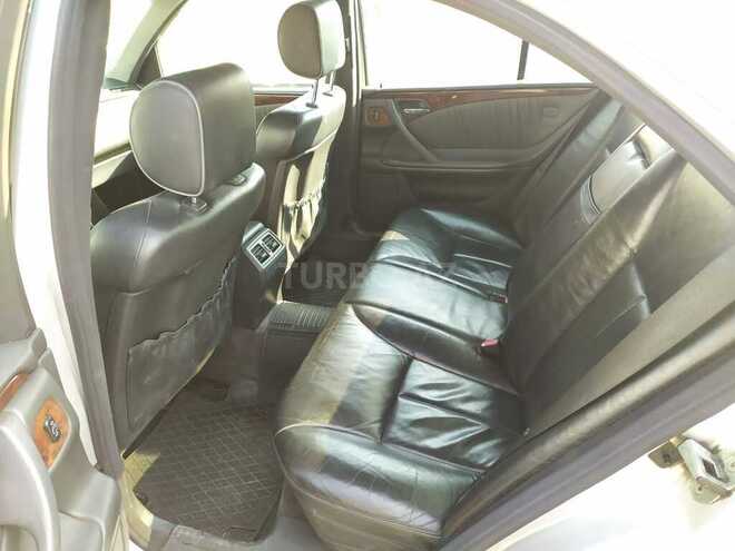 Mercedes E 220 1999, 485,545 km - 2.2 л - Qax