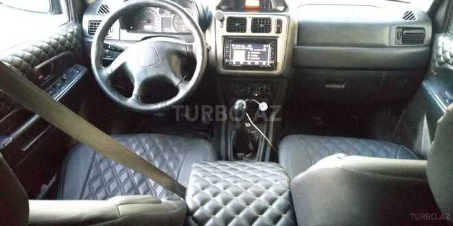 Mitsubishi Pajero io 1999, 380,000 km - 2.0 l - Bakı