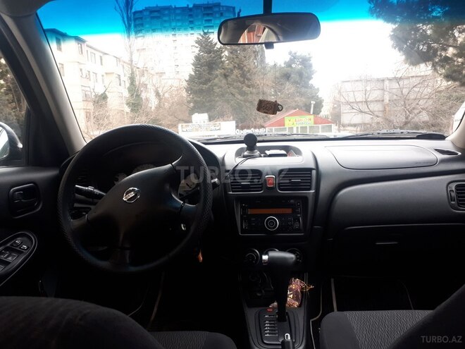 Nissan Sunny 2010, 285,000 km - 1.6 л - Bakı