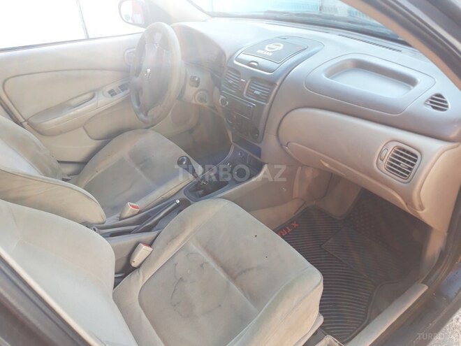 Nissan Sunny 2006, 236,000 km - 1.3 l - Bakı