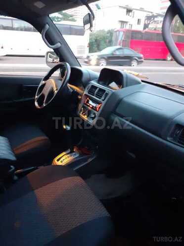 Mitsubishi Pajero io 1999, 197,644 km - 1.8 l - Bakı
