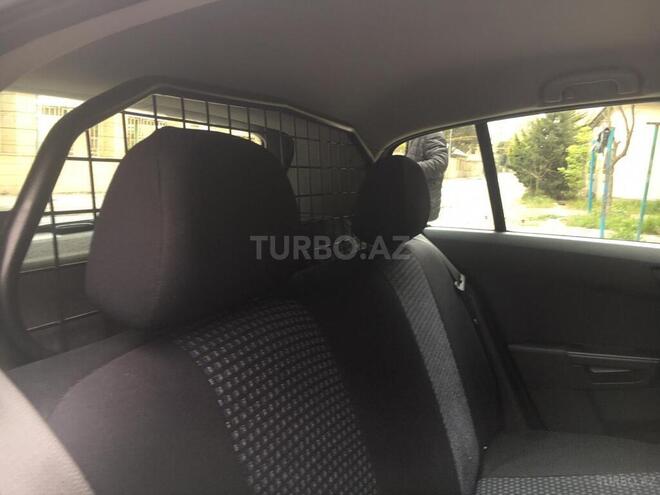 Opel Astra 2010, 148,000 km - 1.4 л - Bakı