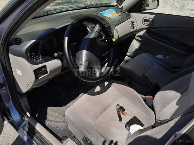 Nissan Sunny 2002, 242,000 km - 1.6 l - Bakı