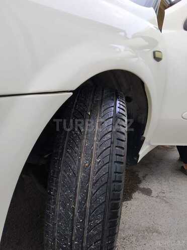 Nissan Sunny 2010, 250,000 km - 1.6 l - Bakı