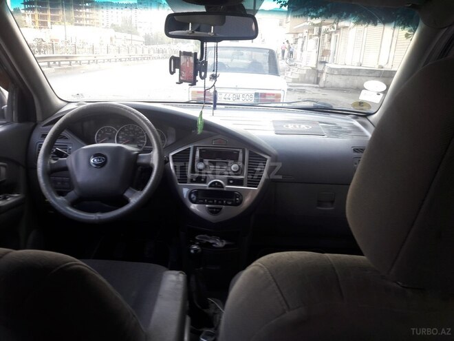 Kia Carens 2005, 250,000 km - 2.0 l - Bakı