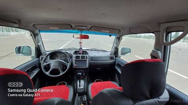 Mitsubishi Pajero io 2002, 274,778 km - 2.0 l - Bakı