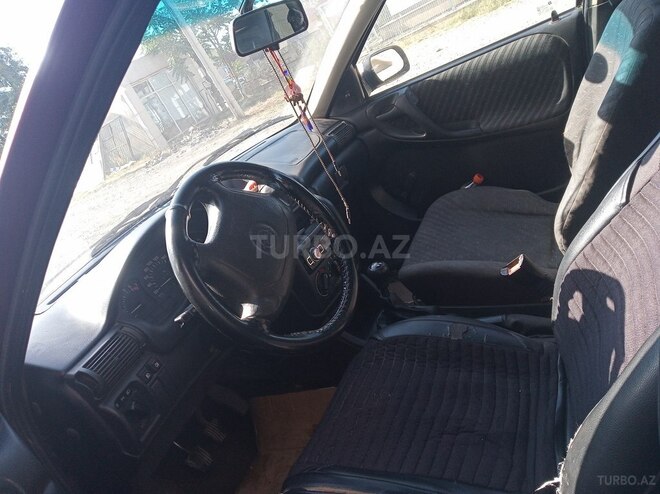 Opel Astra 1997, 132,000 km - 1.6 л - Quba