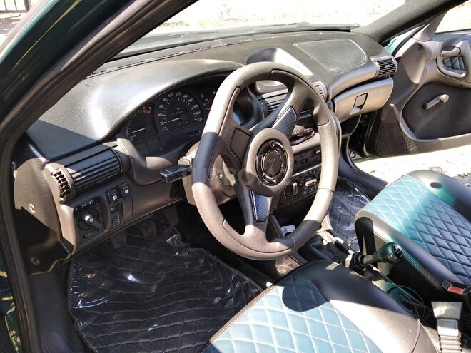 Opel Astra 1998, 295,000 km - 1.5 l - Balakən