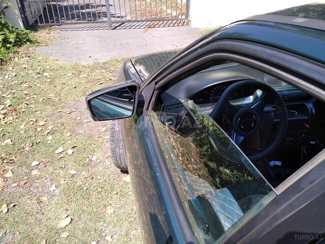 Opel Astra 1998, 295,000 km - 1.5 l - Balakən