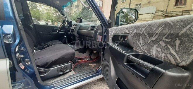 Mitsubishi Pajero io 1998, 562,341 km - 1.8 l - Bakı