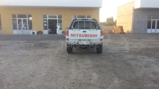 Mitsubishi L200 2012, 11,213 km - 2.5 л - Salyan