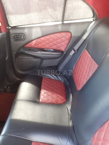 Nissan Sunny 2003, 244,000 km - 1.3 l - Bakı