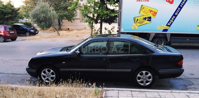 Mercedes E 230 1998, 313,000 km - 2.4 л - Bakı