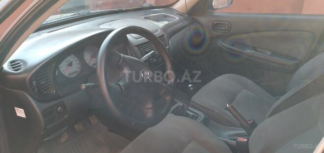 Nissan Sunny 2006, 220,000 km - 1.3 л - Astara