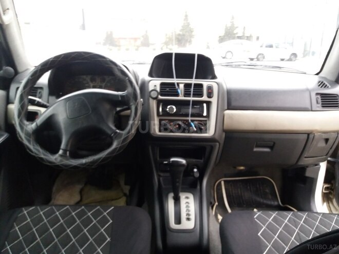 Mitsubishi Pajero io 1999, 360,000 km - 2.0 l - Sumqayıt