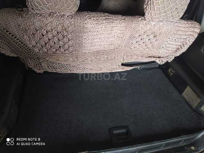 Mitsubishi Pajero io 2001, 300,000 km - 2.0 l - Bakı