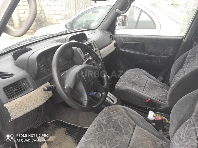 Mitsubishi Pajero io 1999, 248,000 km - 1.8 l - Bakı