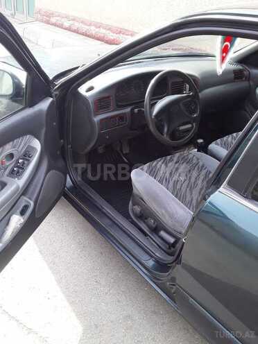 Kia Clarus 1999, 232,900 km - 2.0 л - Quba