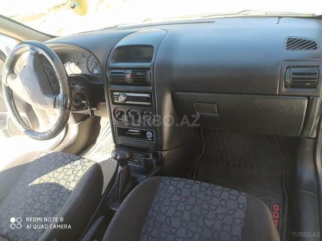 Opel Astra 1999, 205,036 km - 1.6 л - Qusar