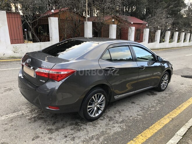 Toyota Corolla 2015, 165,000 km - 1.6 l - Bakı