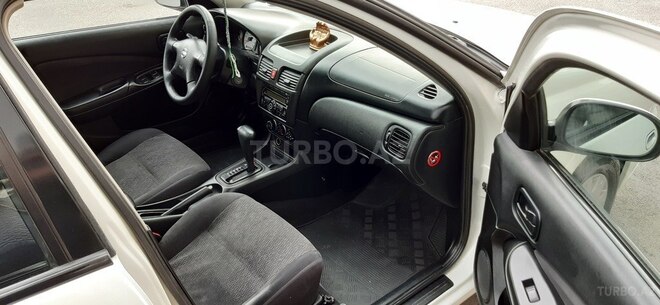 Nissan Sunny 2009, 176,000 km - 1.6 l - Bakı