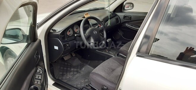 Nissan Sunny 2009, 176,000 km - 1.6 l - Bakı