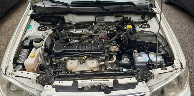 Nissan Sunny 2009, 176,000 km - 1.6 l - Bakı