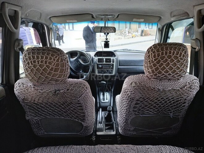Mitsubishi Pajero io 2002, 237,000 km - 2.0 л - Sumqayıt