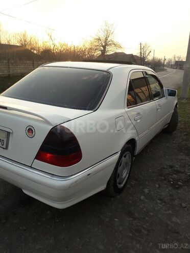 Mercedes C 230 1996, 238,441 km - 2.3 л - Qax