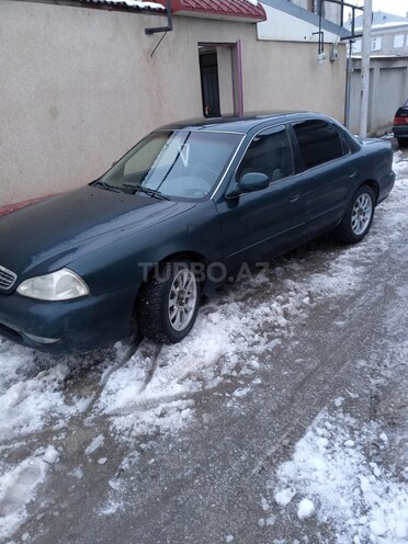 Kia Clarus 1999, 232,700 km - 2.0 л - Quba