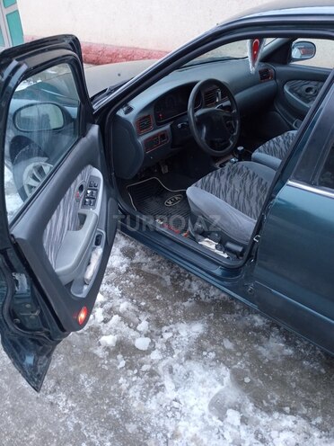 Kia Clarus 1999, 232,700 km - 2.0 л - Quba