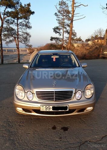 Mercedes E 220 2005, 240,000 km - 2.2 л - Quba