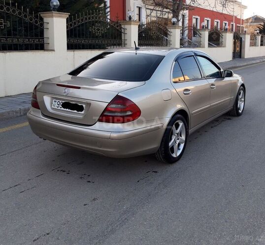 Mercedes E 220 2005, 240,000 km - 2.2 л - Quba
