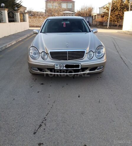 Mercedes E 220 2005, 240,000 km - 2.2 л - Quba