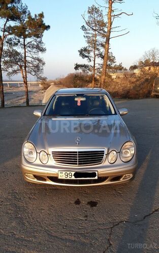 Mercedes E 220 2005, 240,000 km - 2.2 л - Quba