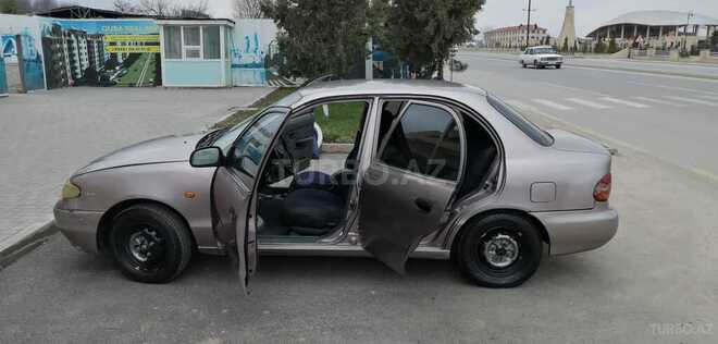 Hyundai Accent 1996, 128,000 km - 1.3 l - Quba