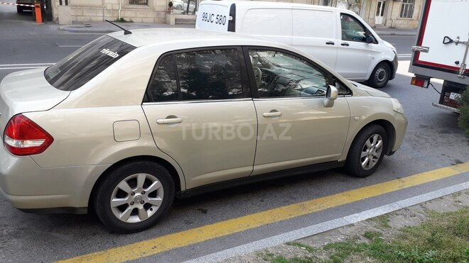 Nissan Tiida 2006, 303,000 km - 1.6 l - Bakı