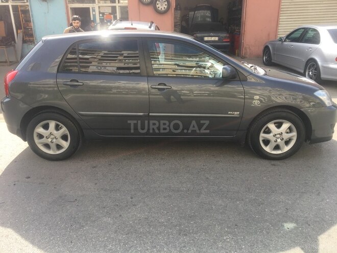 Toyota Corolla 2006, 245,000 km - 1.4 l - Bakı