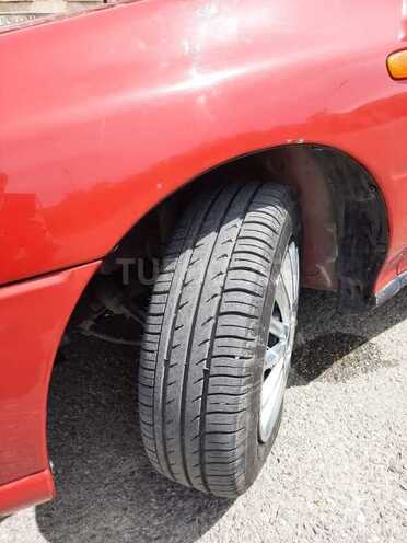 Subaru Impreza 1997, 367,000 km - 1.6 l - Qusar