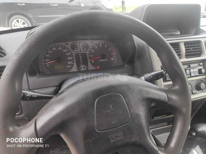 Mitsubishi Pajero io 2002, 398,000 km - 2.0 l - Bakı