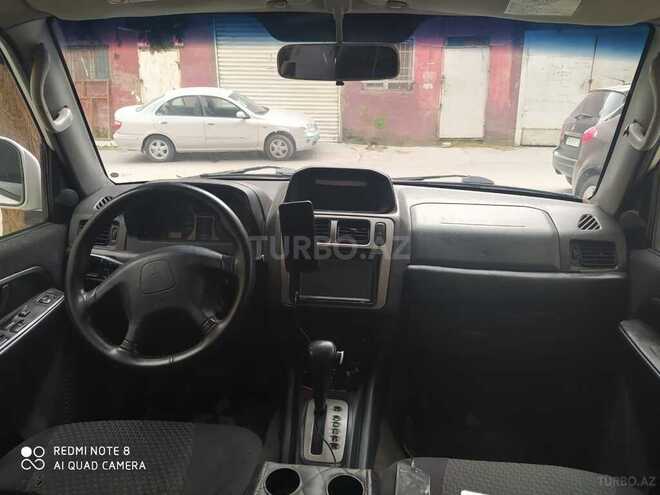 Mitsubishi Pajero io 1999, 321,456 km - 2.0 l - Bakı