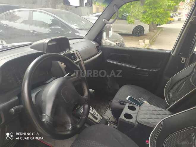 Mitsubishi Pajero io 1999, 321,456 km - 2.0 l - Bakı