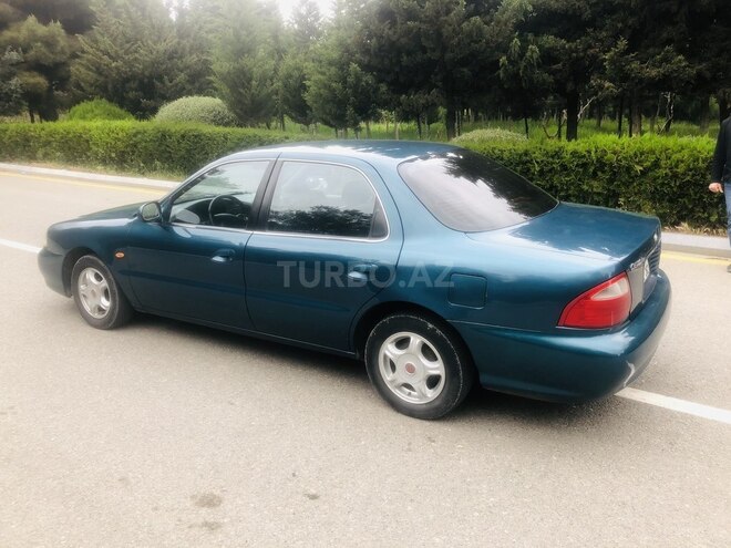 Kia Clarus 1999, 232,000 km - 1.8 l - Bakı