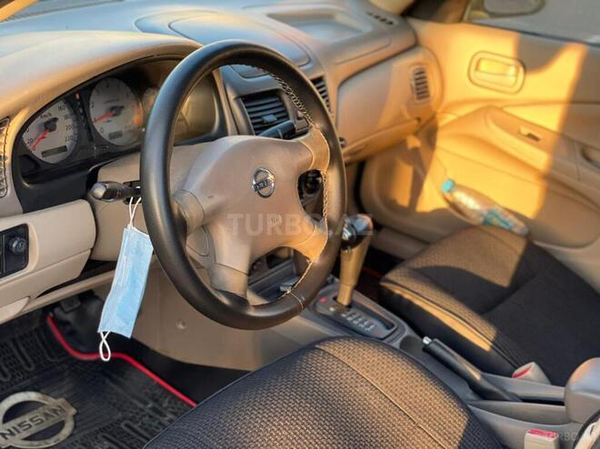 Nissan Sunny 2009, 176,000 km - 1.6 l - Bakı