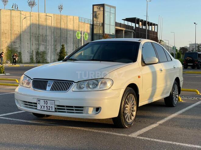 Nissan Sunny 2009, 176,000 km - 1.6 l - Bakı